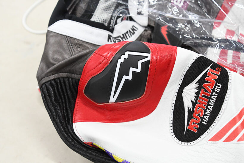 Kushitani supports riders in the paddock. MotoGP racing suit production site